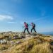 Utjecaj koenzima Q10 na zdravlje: Gdje sve pomaže, koliko ga treba uzimati couple hiking nanos plateau slovenia against blue sky scaled Na planinarenju u Sloveniji